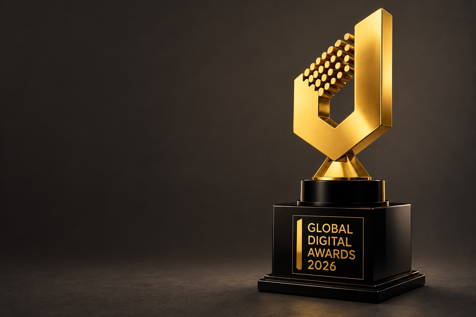 The Global Digital Awards 2026 trophy, with a sculpted gold emblem and engraved black pedestal